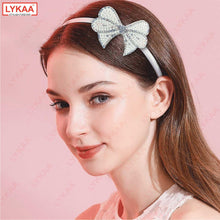WHITE PEARL BOW HAIR BAND